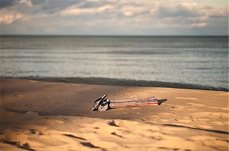 simsearch:872-08914934,k - flip flops and mat sitting on a lake beach, Oscoda, MI. Stock Photo - Rights-Managed, Code: 872-08914982