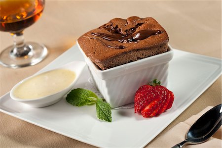 Molten chocolate cake in white ramekin, David's Restaurant, Amelia Island, FL. Stock Photo - Rights-Managed, Code: 872-08915023