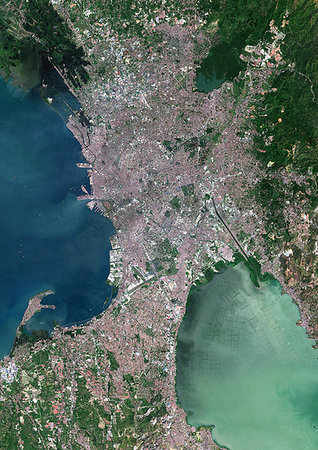 simsearch:872-09185542,k - Color satellite image of Metropolitan Manila, Philippines. This area is officially known as the National Capital Region and is commonly known as Metro Manila. Image collected on October 25, 2016 by Sentinel-2 satellites. Photographie de stock - Rights-Managed, Code: 872-09185600