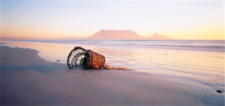 Weidenkorb am Strand bei Sonnenuntergang Tafelberg, Kapstadt, Südafrika Stockbilder - Lizenzpflichtiges, Bildnummer: 873-06440163