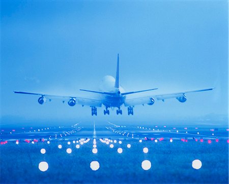 Back View of Airplane on Landing Strip Stock Photo - Rights-Managed, Code: 873-06440262