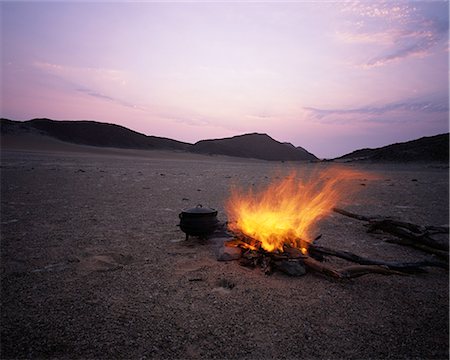 desert at dusk - Campfire near Messum Crater at Dusk, Brandberg, Namibia, Africa Foto de stock - Con derechos protegidos, Código: 873-06440438