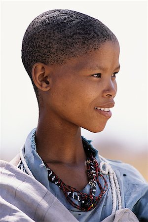 Portrait of Bushman Child Outdoors Namibia, Africa Stock Photo - Rights-Managed, Code: 873-06440564