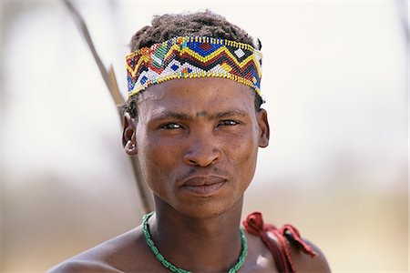 Portrait of Bushman in Traditional Headdress Namibia, Africa Foto de stock - Con derechos protegidos, Código: 873-06440562