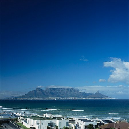 Table Mountain, Holiday Homes In Foreground, Bloubergstrand, Western Cape, South Africa Stock Photo - Rights-Managed, Code: 873-06440868