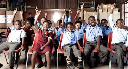 simsearch:6110-06702683,k - African school pupils smiling at camera with their hands in the air Stock Photo - Rights-Managed, Code: 873-06675249
