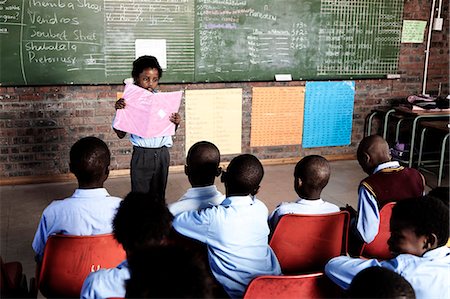 African school pupil presenting to her class Stock Photo - Rights-Managed, Code: 873-06675254