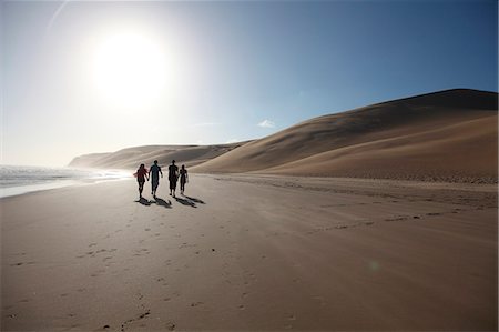 simsearch:873-06675568,k - Two couples walking along a beach, Port Elizabeth, South Africa Stock Photo - Rights-Managed, Code: 873-06675641