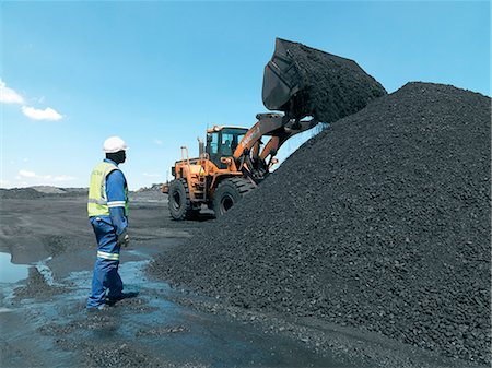 Wheel loader depositing coal, Palesa Coal Mine Stock Photo - Rights-Managed, Code: 873-07156999